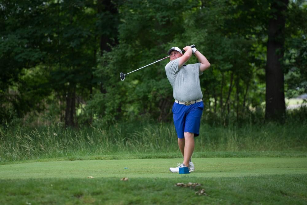 GVL / Luke Holmes - Chad Johnson tees off. The first round of match play for the Michigan Amateur was held at Egypt Valley Country Club on Thursday, June 22, 2017.