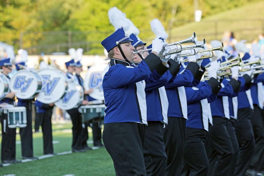 GVL / Emily Frye 
The Laker Marching Band leads the football team out onto the field for the game against Davenport University on Saturday September 9, 2017.