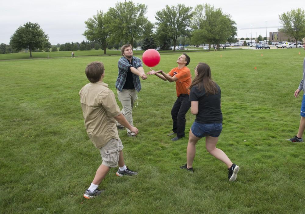 GVL / Luke Holmes - Students play a game with a ball. The Paleo-Olympics were held in the KC West Lawn on Friday, Sept. 23, 2016.