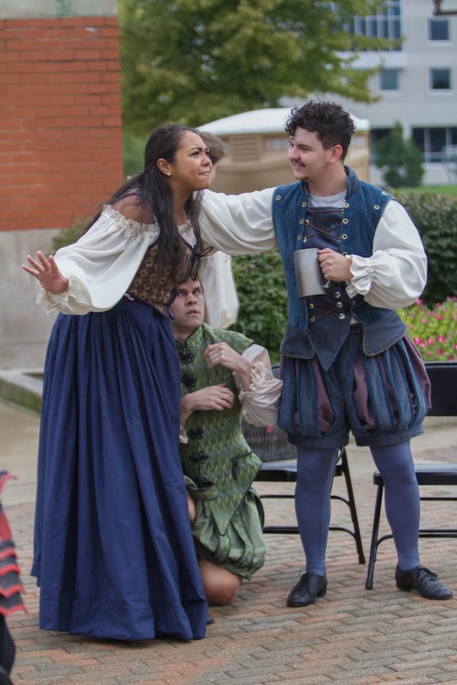 GVL/Mackenzie Bush - Actors hold a skit at the Carillon Tower to show what life was like in the 1500s at the Renaissanec Festival on Saturday, Oct. 1, 2016.