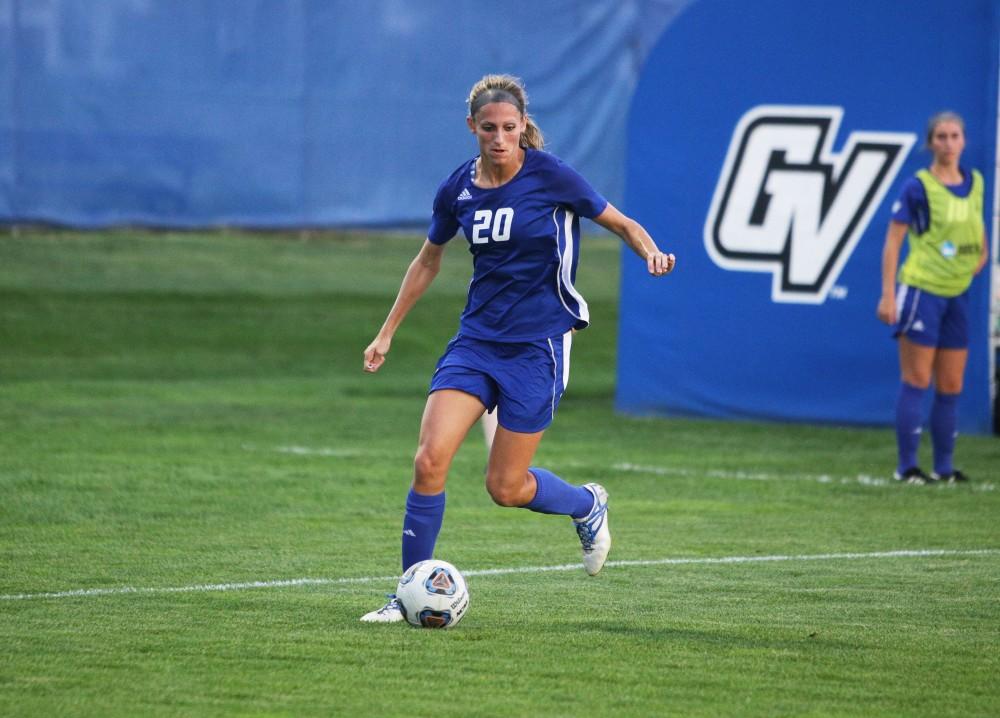 GVL / Emily FryeGabriella Mencotti takes a ball down the field during the game against SVSU on Friday September 22, 2017.