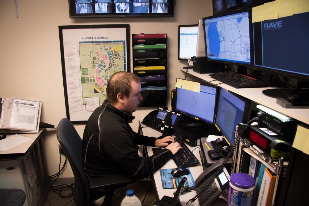 GVL / Spencer Scarber Grand Valley State Emergency operator (name redacted) performing daily tasks at Grand Valley Police Department disbatch center on October 3rd, 2017