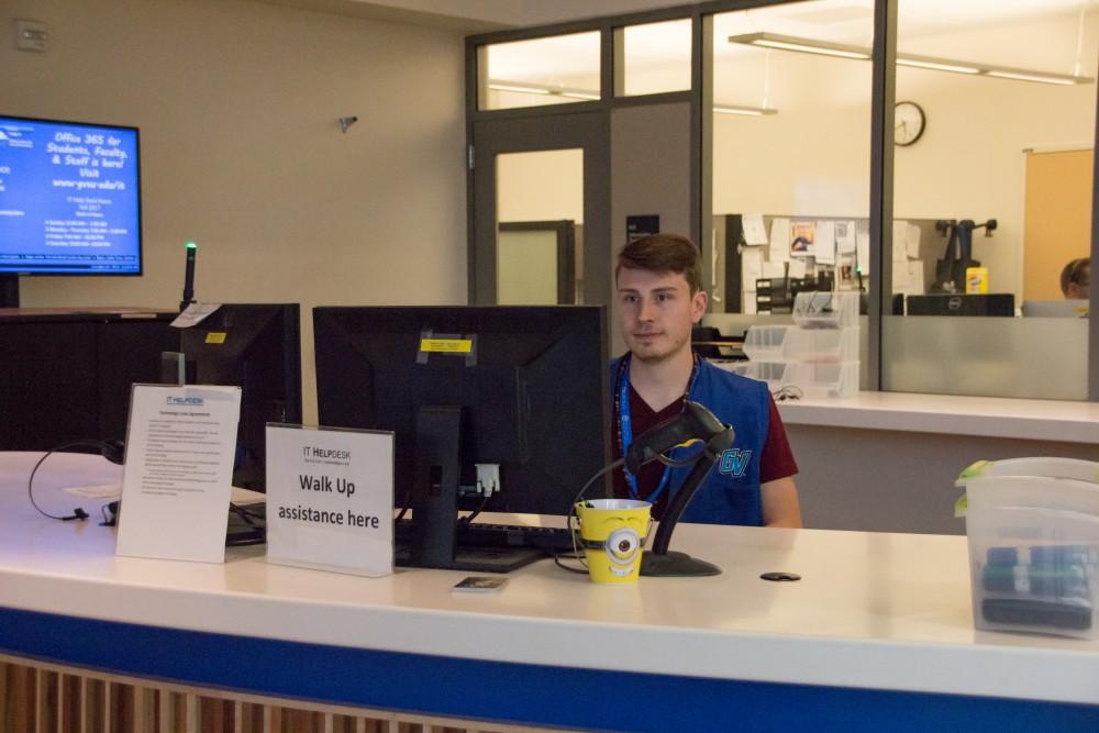 GVL / Dylan McIntyre. Tuesday, Oct. 3rd, 2017. Cody Chinn, IT worker at Mary Idema Pew waiting to help studetnts with questions and software issues.