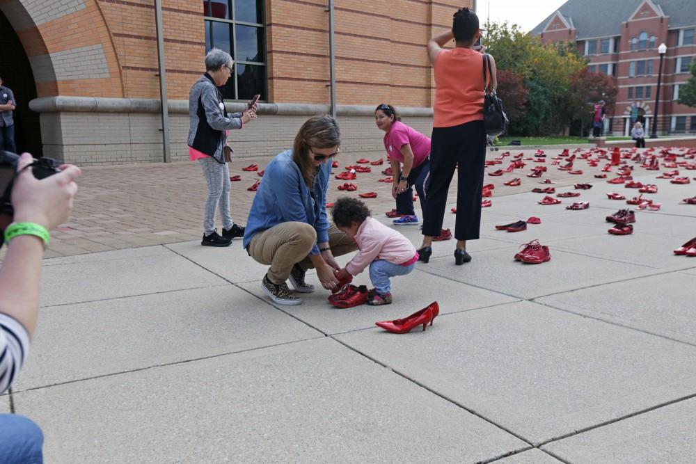 GVL / Emily Frye The Red Shoes Project art installation by Mexican Artist Elina Chauvet on Saturday October 21, 2017. 