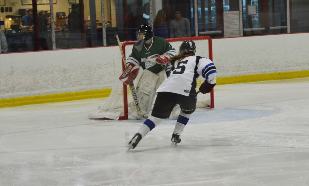 GVL/Hannah Zajac-- Allison Stapleton sets up to score against Michigan State University on Saturday 14 Oct 2017.