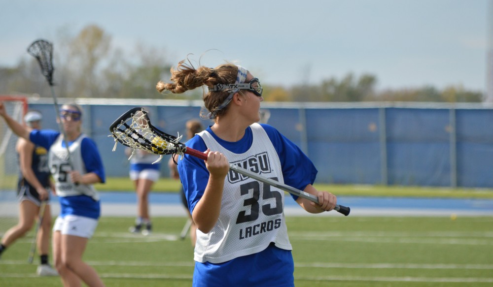 GVL/Hannah Zajac-- Sarah Staggard looks for someone to pass to against Michigan on Saturday 21 Oct 2017.