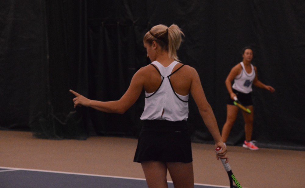 GVL/ Hannah Zajac-- Abby Perkins scores match point against Lake Superior State on 7 Oct 2017.