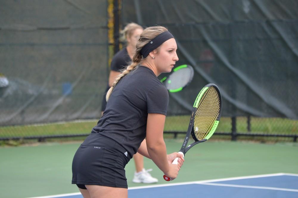GVL/Hannah Zajac-- Livia Christman sets up for her doubles match against Saginaw Valley on Saturday 21 Oct 2017. 
