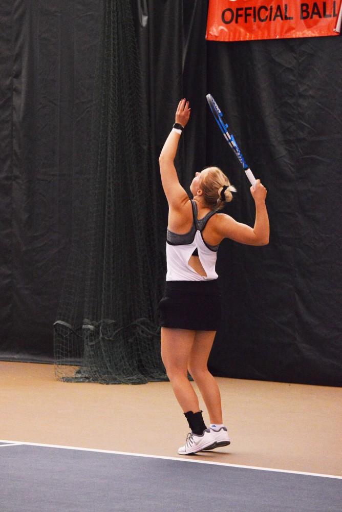 GVL/Hannah Zajac-- Madison Ballard serves up a strong start to thier doubles match on 7 Oct 2017.