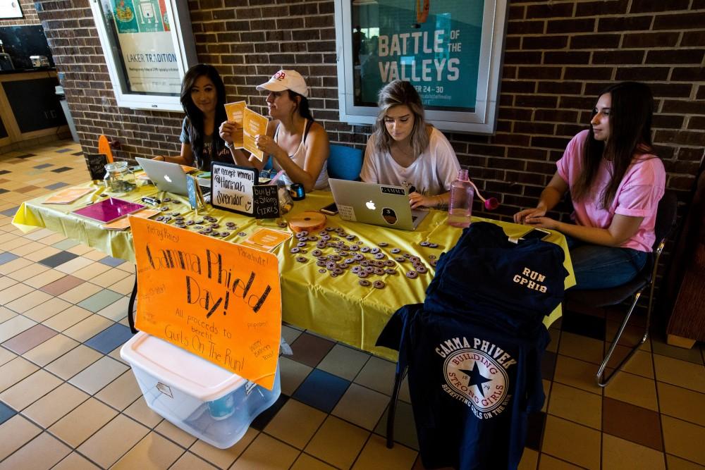 GVL / Matt Read     The Sorority Gamma Phi sets up a booth in Kirkhoff on Tuesday, October 3rd. Their goal is to raise money for Girls on the Run