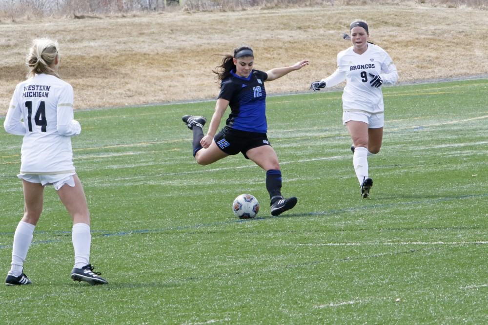 GVL / Robbie Triano    Cecilia Steinwascher takes the ball down the field during the spring opener on Saturday March 24, 2018.