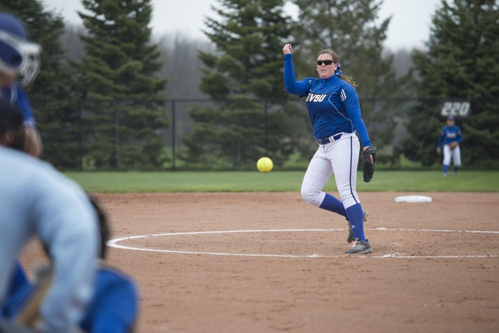 GVL / Luke Holmes - Allison Lipovsky (18) throws the pitch. Grand Valley Women's Softball won 9-5 in their first game against Lake Superior State.