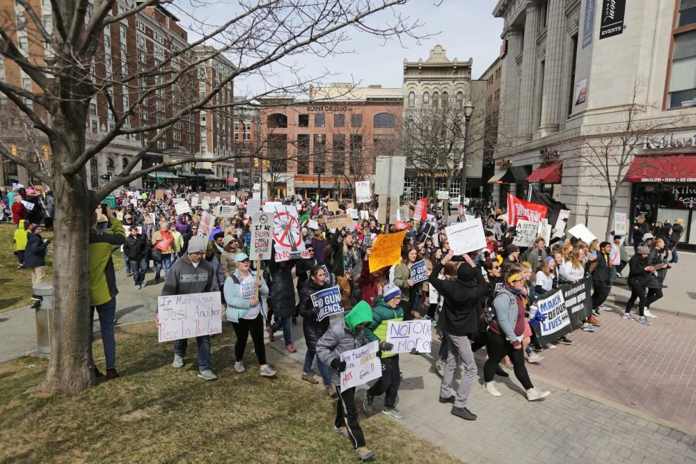 GVL / Emily Frye Student leaders from Forest Hills Northern High School direct the March For Our Lives protest in Grand Rapids, MI on Saturday March 24, 2018. 