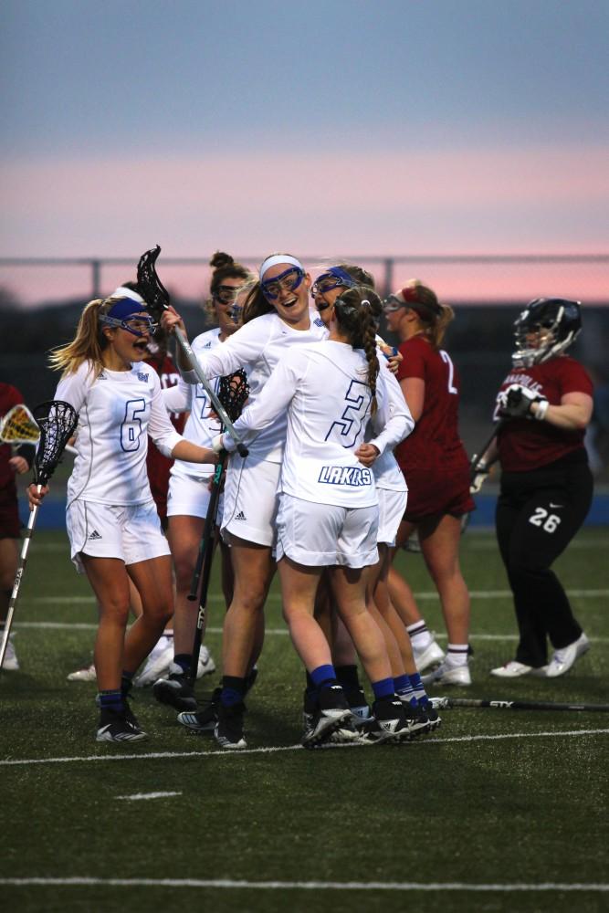GVL / Sheila Babbitt
Teammates hug number 18, Meghan Datema, after a goal at their game against Indianapolis on March 29th, 2018.