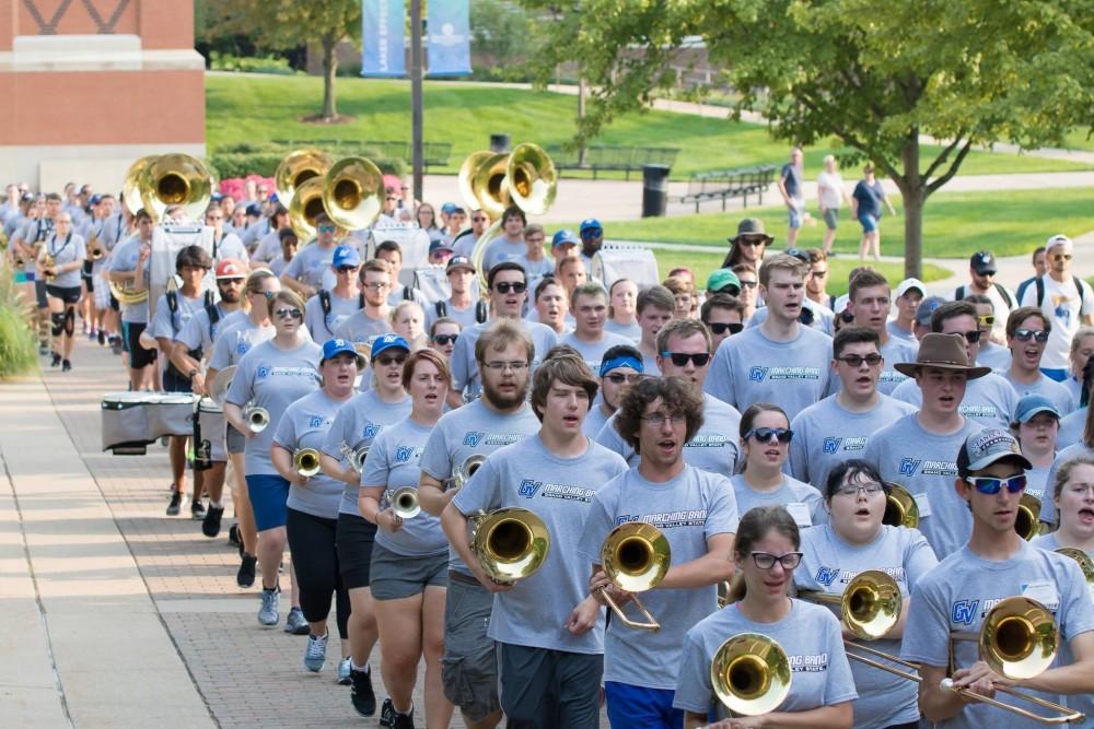 <p>The GVSU Marching Band marches to a football open scrimmage during band camp to practice a performance.  Courtesy / Lindsey Willett</p>