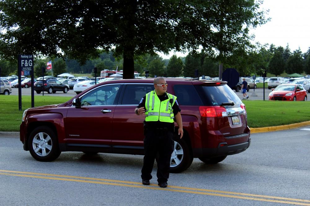 <p>Officer Minh directing traffic 8/30/18. GVL / Archive</p>
