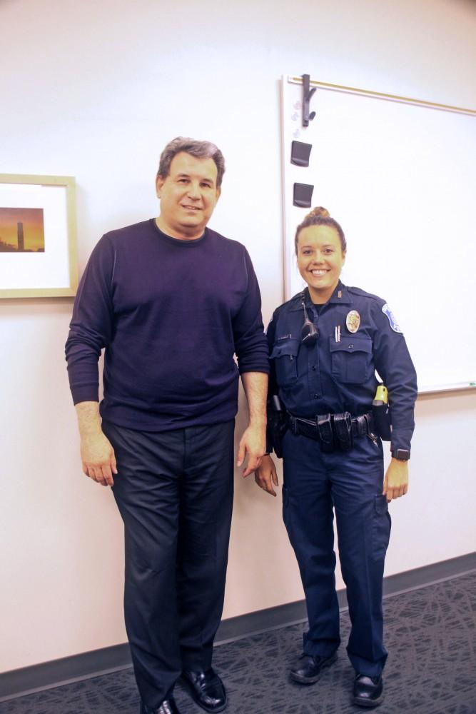<p>Eric Klingensmith (left) and Officer Brittany Howard (right) after presenting “Marijuana Truth, Lies and Consequences” at Kirkhof Center on October 16th, 2018. Courtesy / GVSU</p>