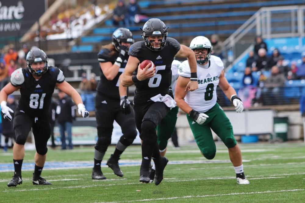 Bart Williams scrambles out of the pocket for a first down against Northwest Missouri State on Saturday, Nov. 17. GVL / Katherine Vasile